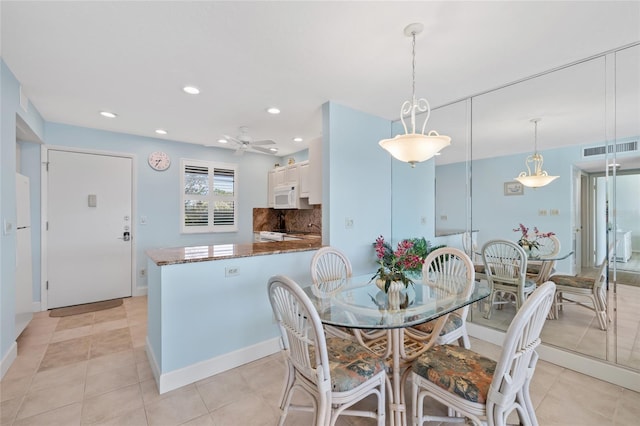 4310 Falmouth Dr Unit 307, Longboat Key, FL 34228 - dining area with ceiling fan, light tile patterned floors, recessed lighting, and baseboards