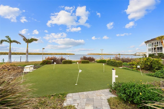 4310 Falmouth Dr Unit 307, Longboat Key, FL 34228 - surrounding community with a water view and a putting green