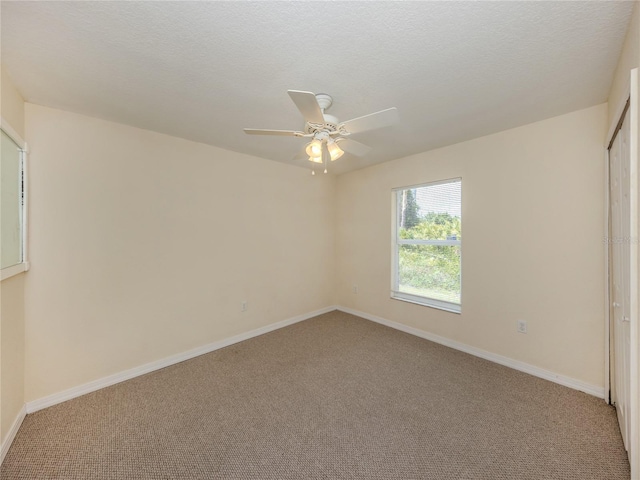 3698 N Chamberlain Blvd, North Port, FL 34286 - carpeted empty room with baseboards and a ceiling fan