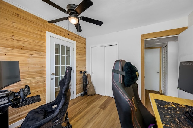 440 42nd St N, Saint Petersburg, FL 33713 - office area featuring wood walls, a ceiling fan, and wood finished floors