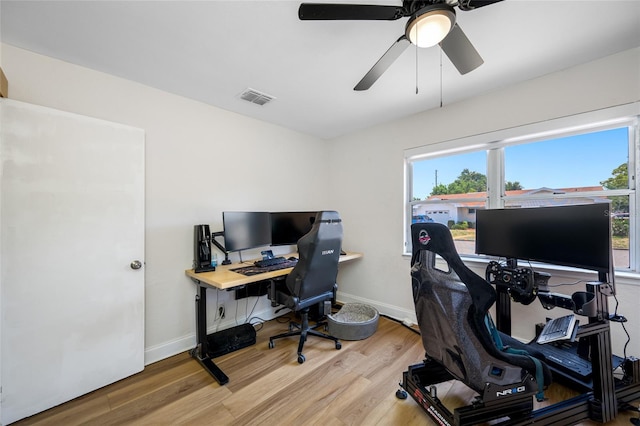 440 42nd St N, Saint Petersburg, FL 33713 - office featuring wood finished floors, a ceiling fan, and baseboards