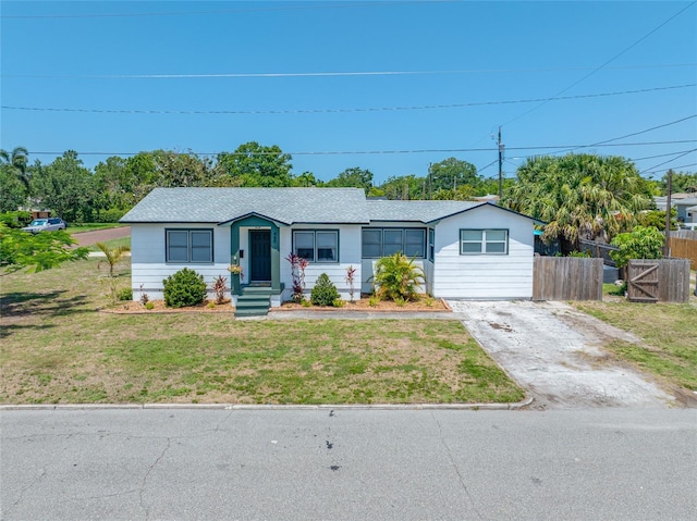 440 42nd St N, Saint Petersburg, FL 33713 - ranch-style house featuring roof with shingles and driveway