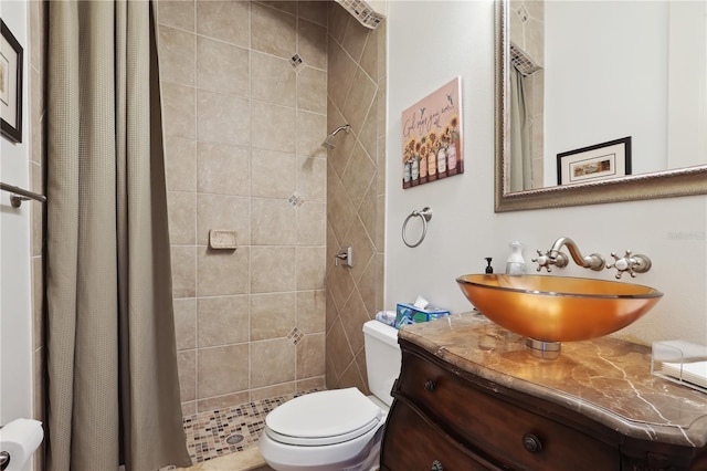 4696 Del Sol Blvd, Sarasota, FL 34243 - bathroom with toilet, tiled shower, and vanity