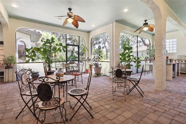 4696 Del Sol Blvd, Sarasota, FL 34243 - view of patio featuring ceiling fan and outdoor dining area