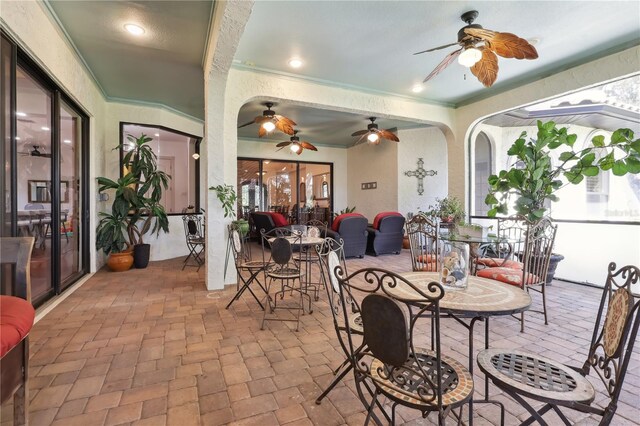 4696 Del Sol Blvd, Sarasota, FL 34243 - view of patio featuring ceiling fan and outdoor dining area