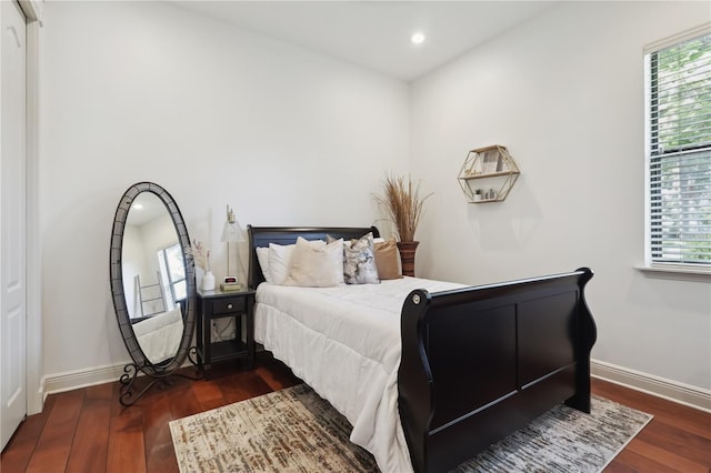 4696 Del Sol Blvd, Sarasota, FL 34243 - bedroom with wood finished floors, multiple windows, baseboards, and recessed lighting