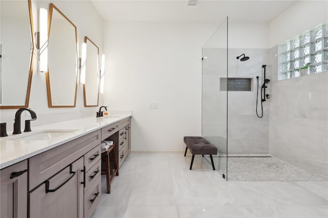 4696 Del Sol Blvd, Sarasota, FL 34243 - bathroom with a walk in shower and double vanity