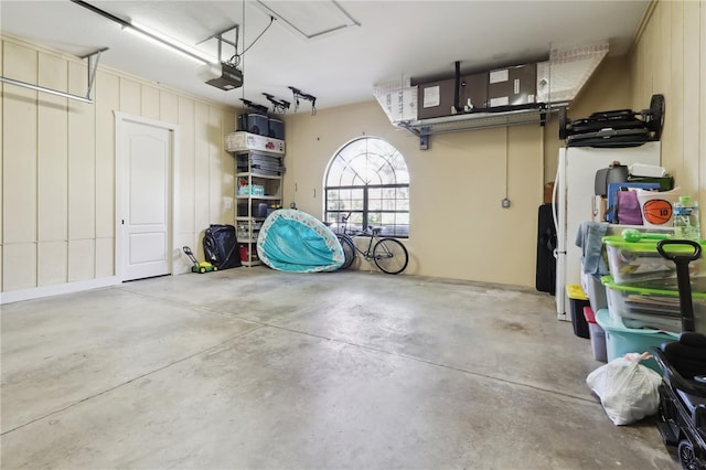 4696 Del Sol Blvd, Sarasota, FL 34243 - garage featuring a garage door opener