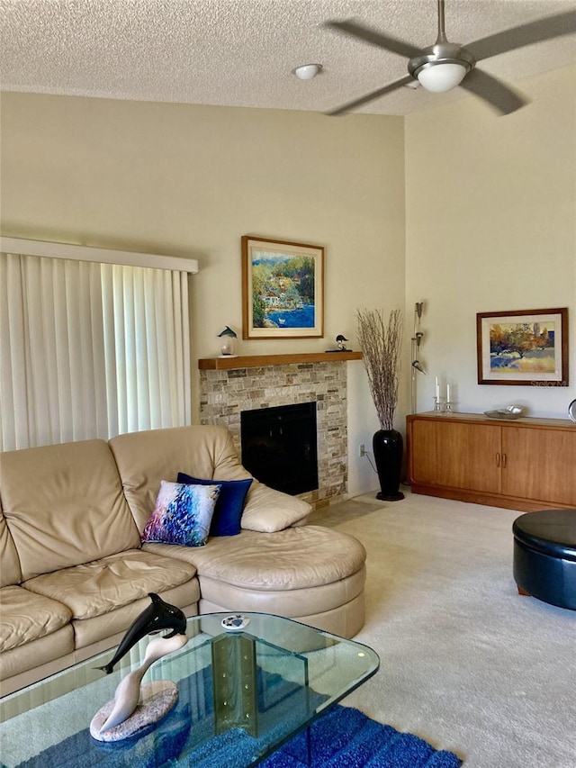 3407 Avenida Madera Unit A, Bradenton, FL 34210 - carpeted living area with ceiling fan, a textured ceiling, and a fireplace