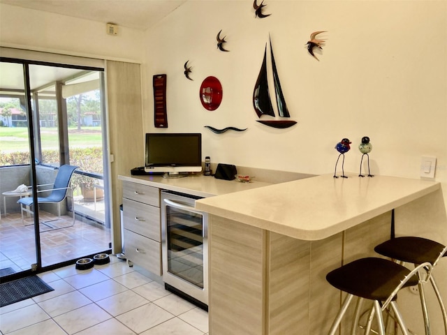 3407 Avenida Madera Unit A, Bradenton, FL 34210 - indoor dry bar with beverage cooler and light tile patterned floors