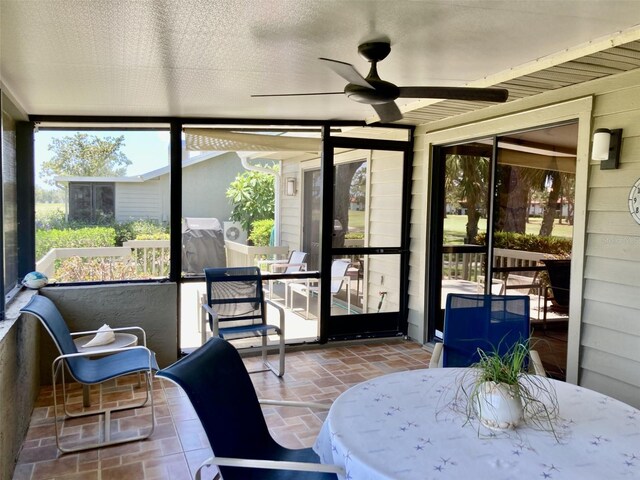 3407 Avenida Madera Unit A, Bradenton, FL 34210 - sunroom featuring a ceiling fan