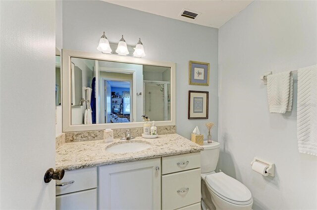 1906 Canterbury Ln Unit 16, Sun City Center, FL 33573 - full bath with vanity, a shower stall, and toilet
