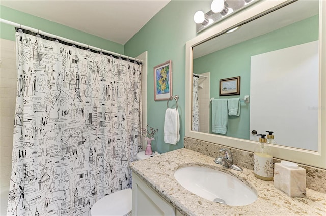 1906 Canterbury Ln Unit 16, Sun City Center, FL 33573 - full bath featuring vanity, toilet, and a shower with shower curtain