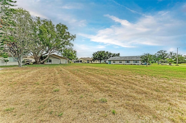 1906 Canterbury Ln Unit 16, Sun City Center, FL 33573 - view of green lawn