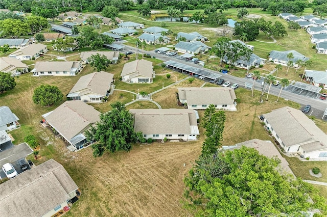 1906 Canterbury Ln Unit 16, Sun City Center, FL 33573 - aerial view of property's location featuring nearby suburban area and a large body of water