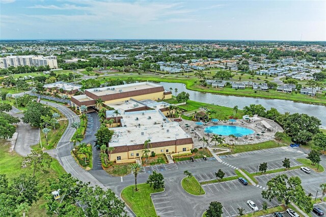 1906 Canterbury Ln Unit 16, Sun City Center, FL 33573 - view of property location with a nearby body of water and a pool