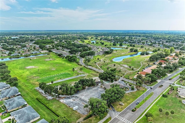 1906 Canterbury Ln Unit 16, Sun City Center, FL 33573 - aerial view of property's location with a nearby body of water and nearby suburban area