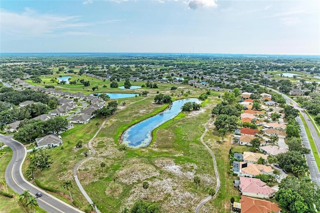 1906 Canterbury Ln Unit 16, Sun City Center, FL 33573 - aerial overview of property's location with a large body of water and nearby suburban area
