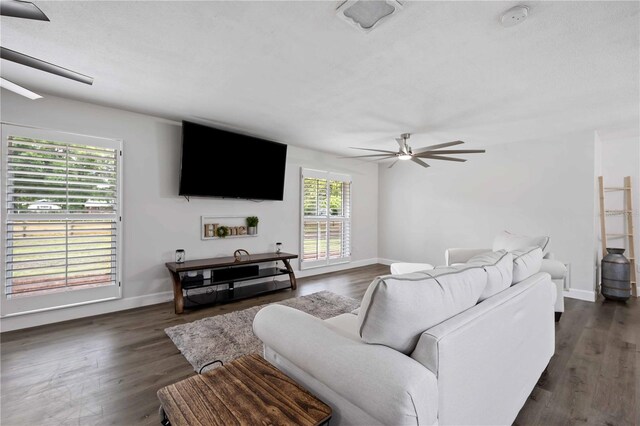 2255 61st St, Sarasota, FL 34243 - living area featuring a ceiling fan, dark wood finished floors, and baseboards