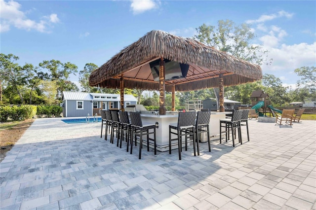 2255 61st St, Sarasota, FL 34243 - view of patio / terrace featuring a gazebo and an outdoor pool
