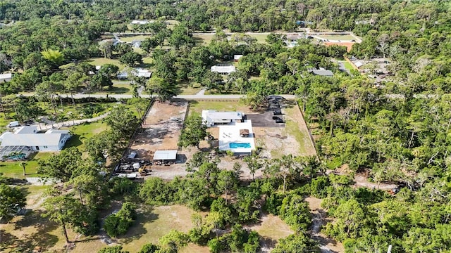 2255 61st St, Sarasota, FL 34243 - view of property location with a forest