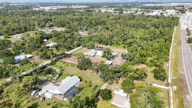 2255 61st St, Sarasota, FL 34243 - aerial overview of property's location featuring a forest