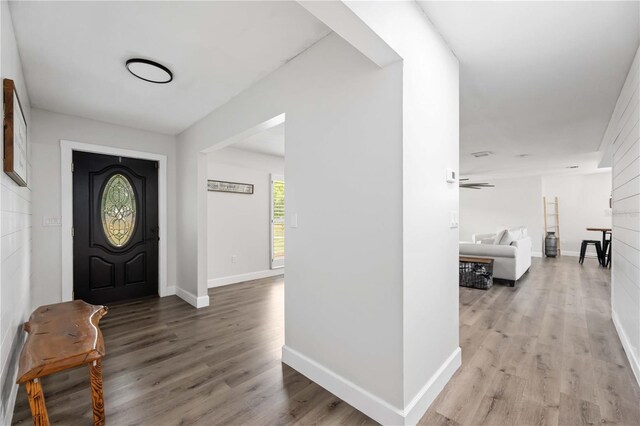 2255 61st St, Sarasota, FL 34243 - foyer entrance featuring light wood-style floors and baseboards