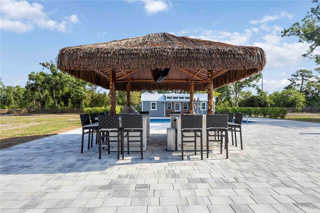 2255 61st St, Sarasota, FL 34243 - view of patio / terrace featuring an outbuilding