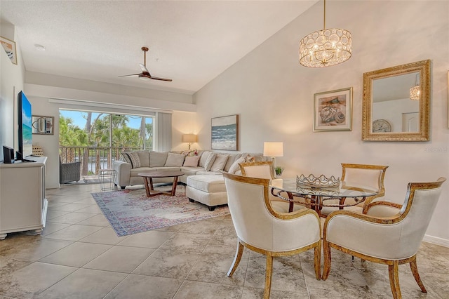 9540 High Gate Dr Unit 1422, Sarasota, FL 34238 - living area featuring high vaulted ceiling, ceiling fan, baseboards, and a chandelier