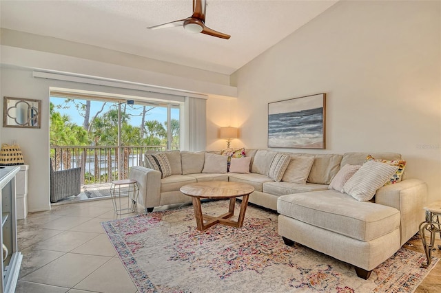 9540 High Gate Dr Unit 1422, Sarasota, FL 34238 - living room featuring vaulted ceiling, ceiling fan, a water view, and light tile patterned floors
