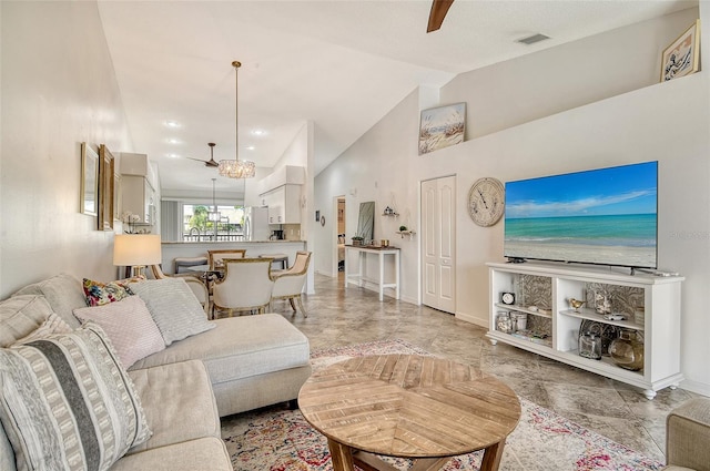 9540 High Gate Dr Unit 1422, Sarasota, FL 34238 - living room with marble finish flooring, baseboards, a chandelier, and high vaulted ceiling