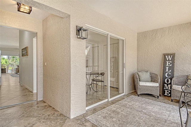 9540 High Gate Dr Unit 1422, Sarasota, FL 34238 - living area with a textured wall