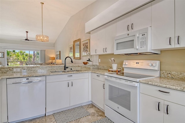 9540 High Gate Dr Unit 1422, Sarasota, FL 34238 - kitchen featuring white appliances, a sink, lofted ceiling, white cabinetry, and light stone counters