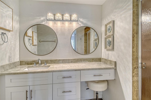 9540 High Gate Dr Unit 1422, Sarasota, FL 34238 - full bathroom featuring vanity and a shower with door