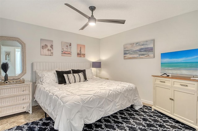 9540 High Gate Dr Unit 1422, Sarasota, FL 34238 - bedroom featuring a ceiling fan and baseboards