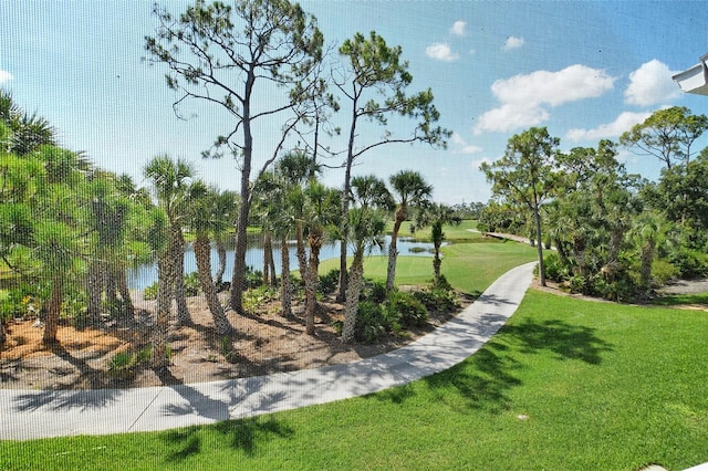 9540 High Gate Dr Unit 1422, Sarasota, FL 34238 - view of property's community featuring a water view and a yard