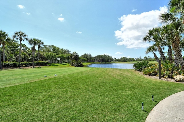 9540 High Gate Dr Unit 1422, Sarasota, FL 34238 - view of community with a water view, a lawn, and view of golf course