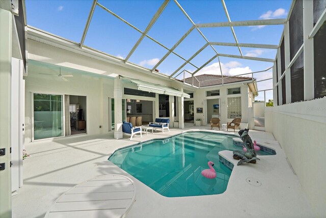 7507 Ascot Ct, University Park, FL 34201 - swimming pool with a patio area, ceiling fan, and glass enclosure