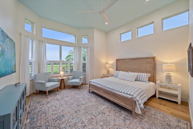 7507 Ascot Ct, University Park, FL 34201 - bedroom with a high ceiling, wood finished floors, a ceiling fan, and recessed lighting