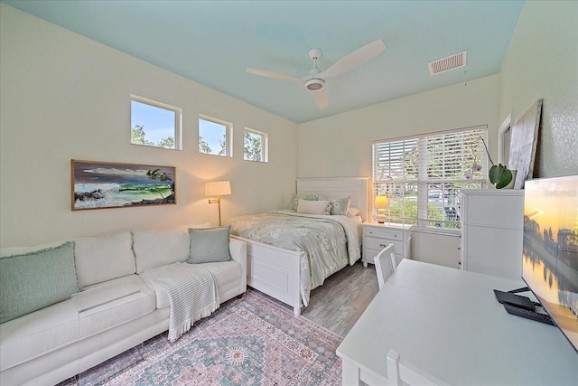 7507 Ascot Ct, University Park, FL 34201 - bedroom with wood finished floors and ceiling fan