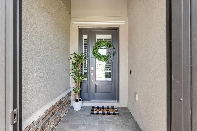 4971 Oyster Pearl St, Bradenton, FL 34211 - property entrance featuring stucco siding