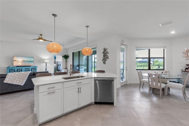4971 Oyster Pearl St, Bradenton, FL 34211 - kitchen featuring stainless steel dishwasher, a sink, open floor plan, plenty of natural light, and recessed lighting