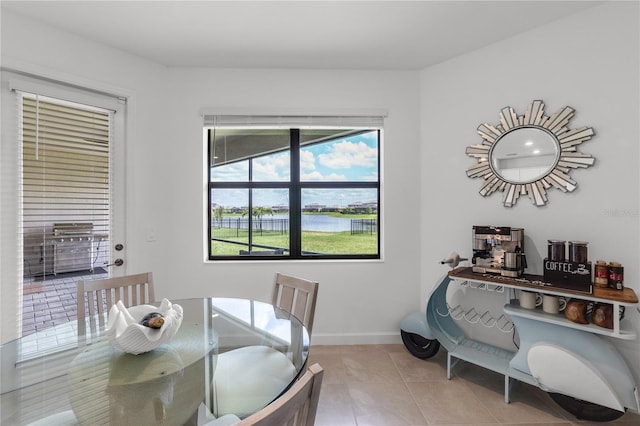 4971 Oyster Pearl St, Bradenton, FL 34211 - tiled dining room with baseboards and a water view