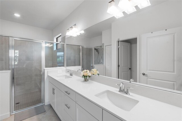 4971 Oyster Pearl St, Bradenton, FL 34211 - bathroom featuring double vanity, a stall shower, and tile patterned floors