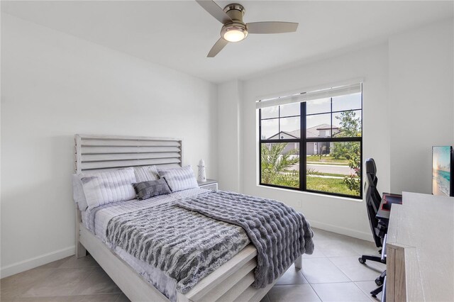 4971 Oyster Pearl St, Bradenton, FL 34211 - bedroom with tile patterned flooring, baseboards, an office area, and a ceiling fan