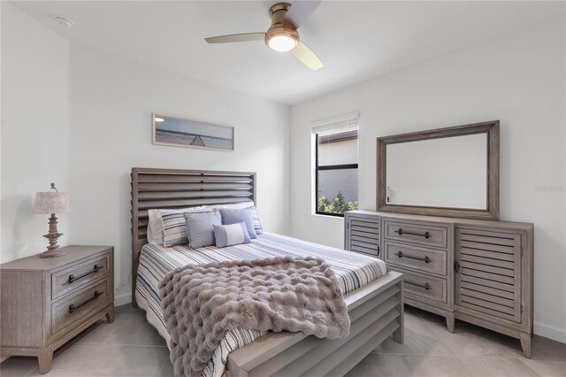 4971 Oyster Pearl St, Bradenton, FL 34211 - bedroom with light tile patterned floors, baseboards, and a ceiling fan