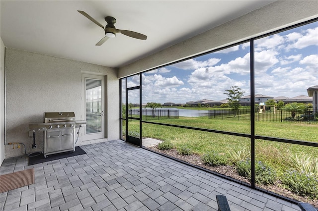 4971 Oyster Pearl St, Bradenton, FL 34211 - unfurnished sunroom featuring a water view and a ceiling fan