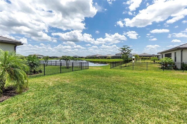 4971 Oyster Pearl St, Bradenton, FL 34211 - view of yard with a water view and a residential view