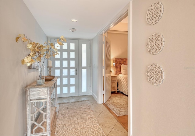 1115 Gulf Of Mexico Dr Unit 304, Longboat Key, FL 34228 - foyer featuring tile patterned floors