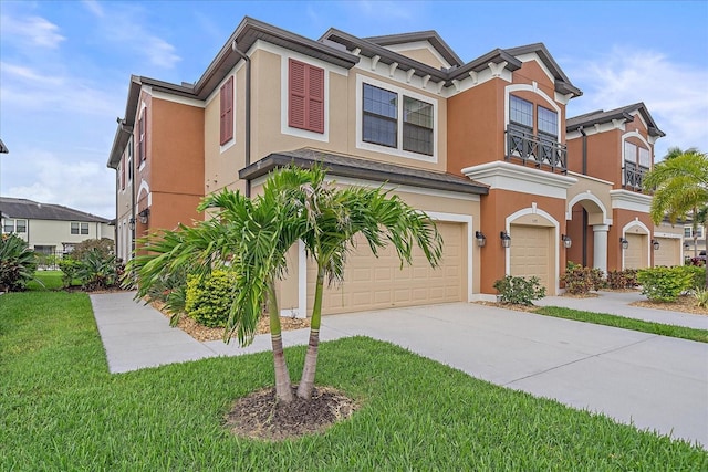 5191 78th St Cir E, Bradenton, FL 34203 - view of front facade with stucco siding, an attached garage, driveway, and a front yard